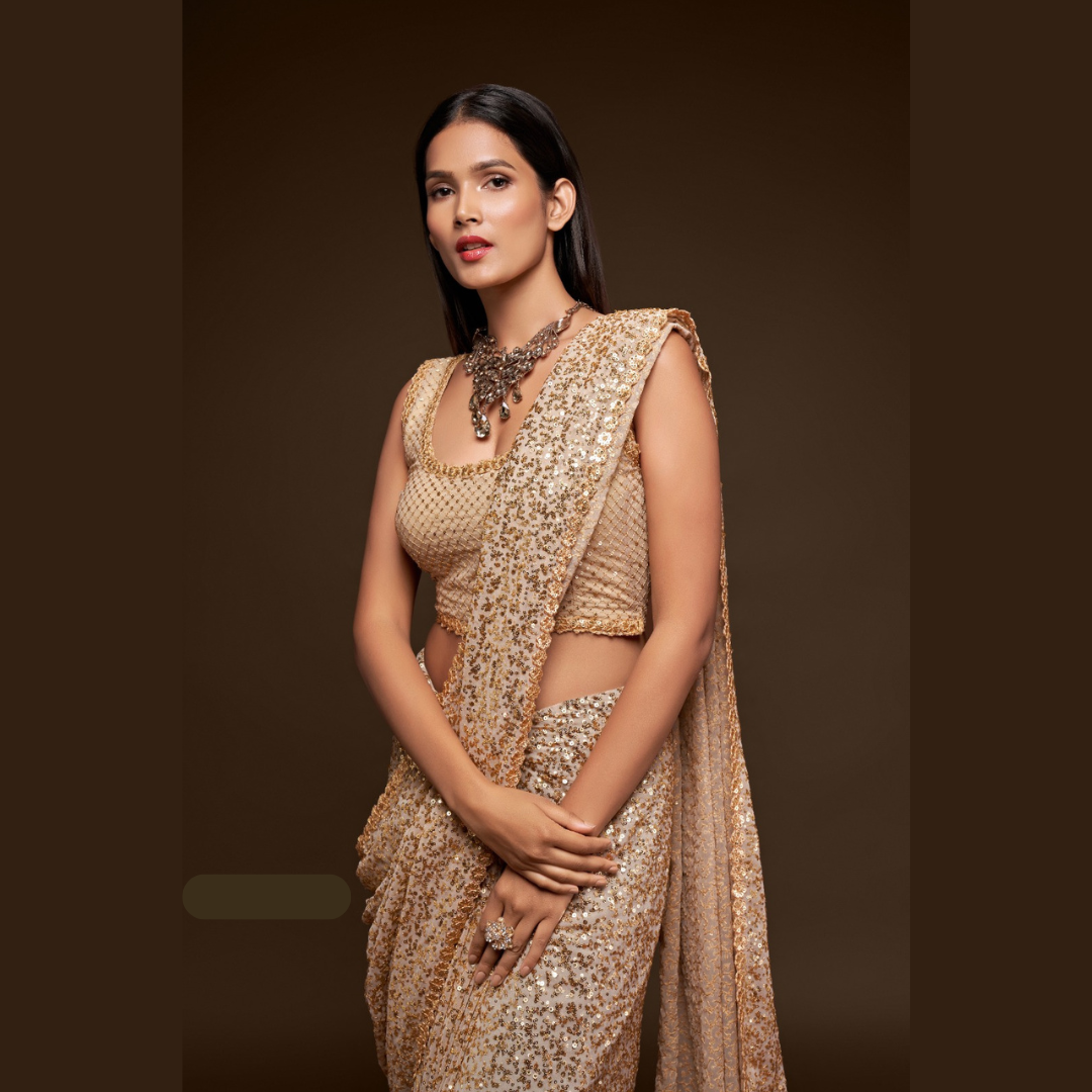 Beige Georgette saree embellished with sequin