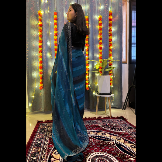 Dual Shade Blue and black ixed Silk saree embellished with stone work on border