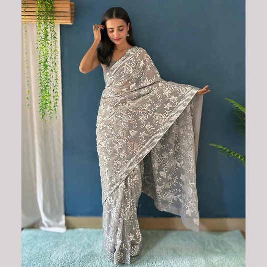 Off White Georgette saree embellished with Sequin