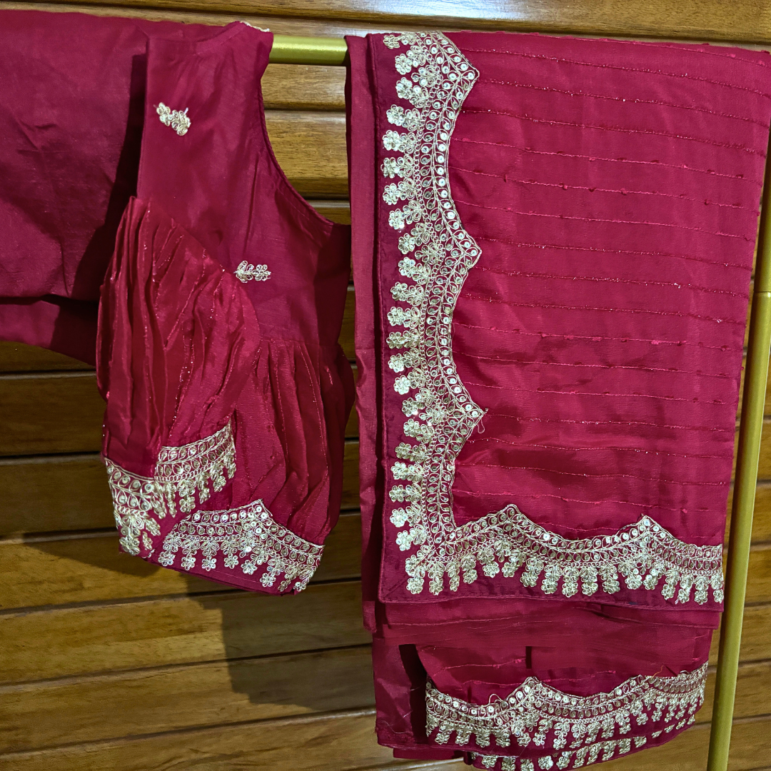 Rani Pink Silk saree embellished with Sequin on border and ready made blouse