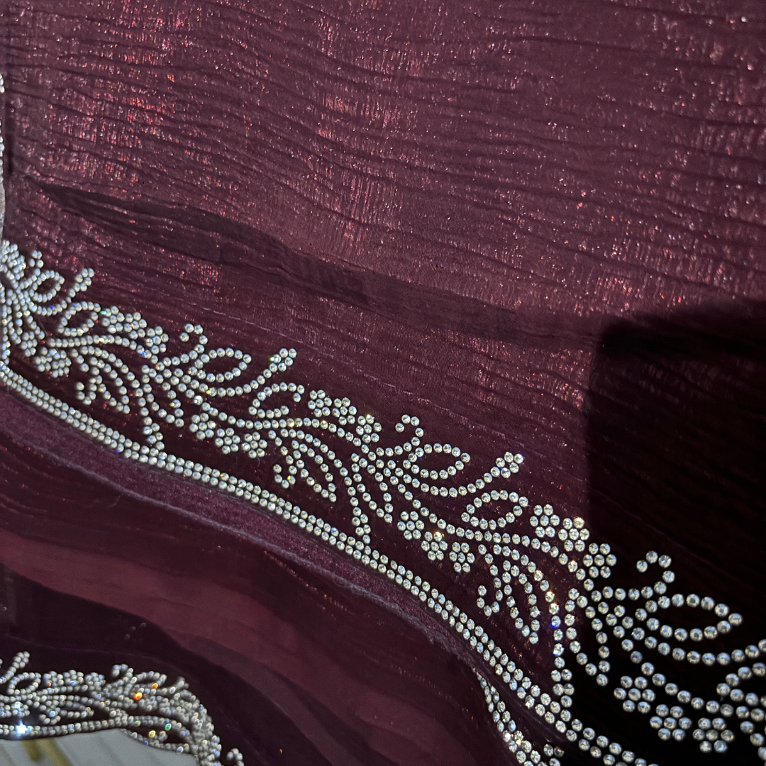 Maroon color saree embellished with Swarovski Stone