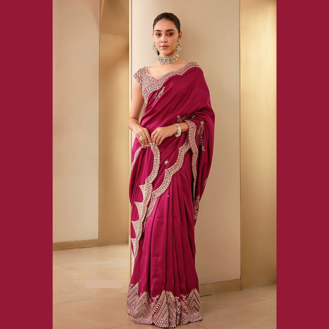 Rani Pink Silk saree embellished with Sequin in border & unstitched blouse piece