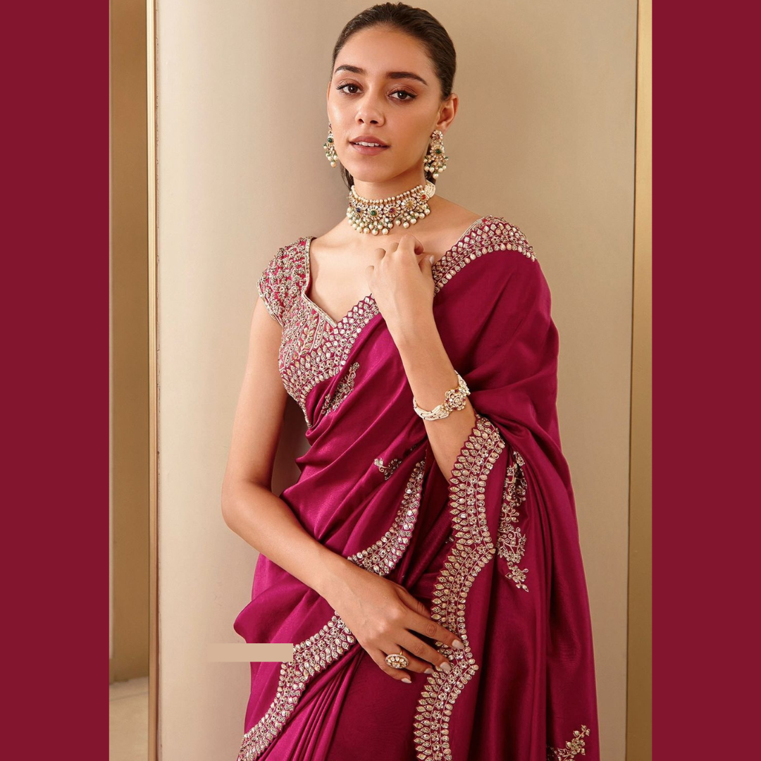 Rani Pink Silk saree embellished with Sequin in border & unstitched blouse piece