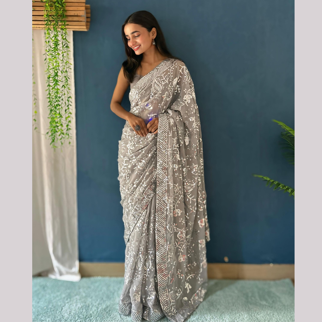 Off White Georgette saree embellished with Sequin