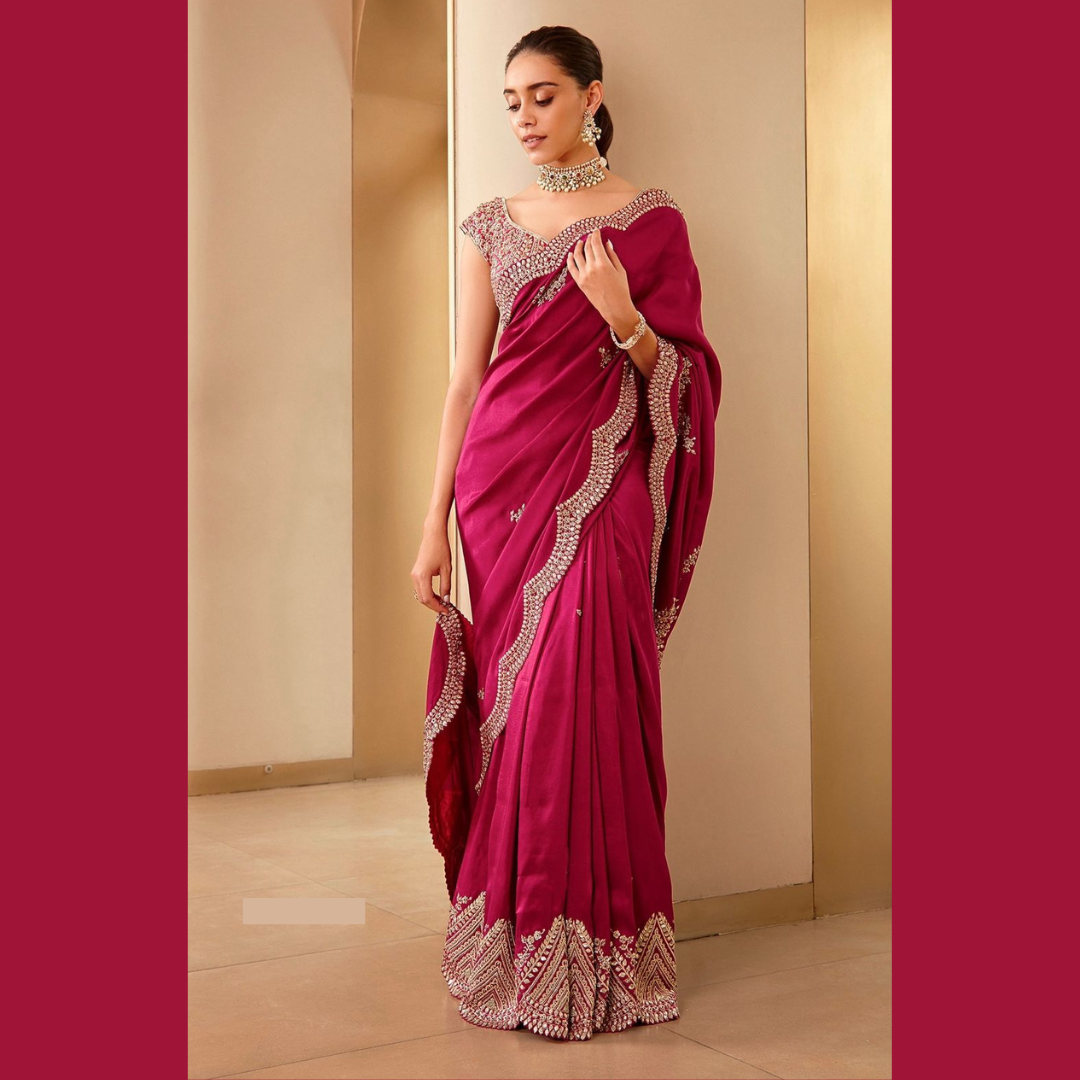 Rani Pink Silk saree embellished with Sequin in border & unstitched blouse piece