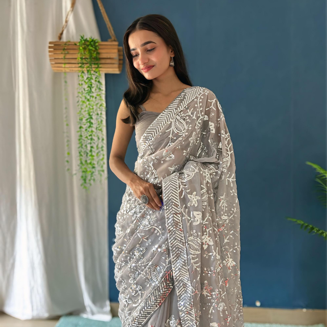 Off White Georgette saree embellished with Sequin