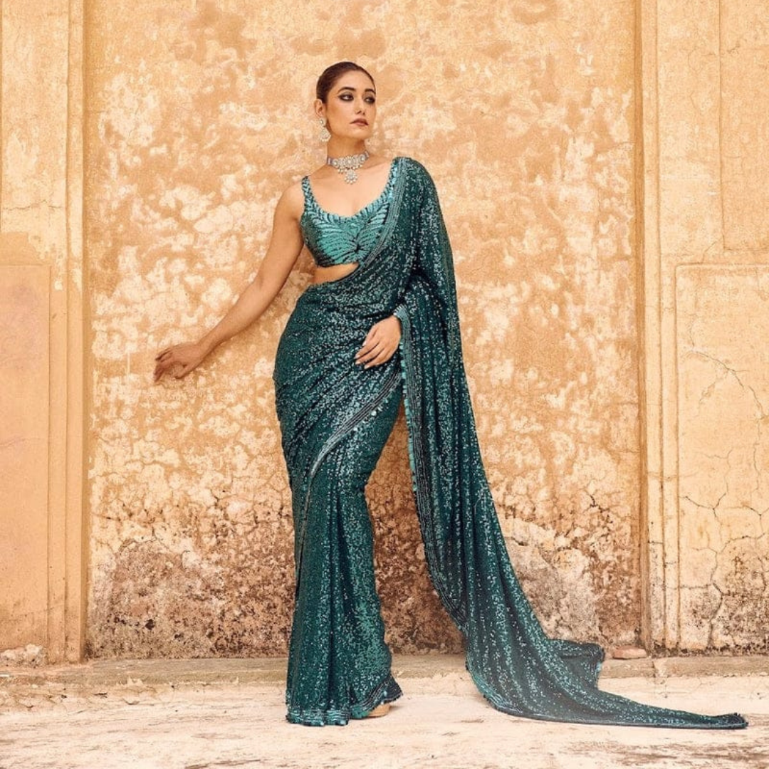 Blue Green Georgette saree embellished with Sequin on border and unstitched sequin blouse